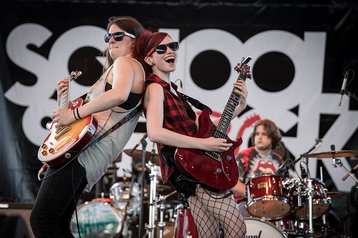 Learn to play live on stage with others at School of Rock.